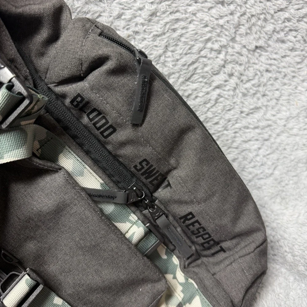 Under Armour UA Project Rock Regiment USDNA Gray Camo Backpack 1315435-001